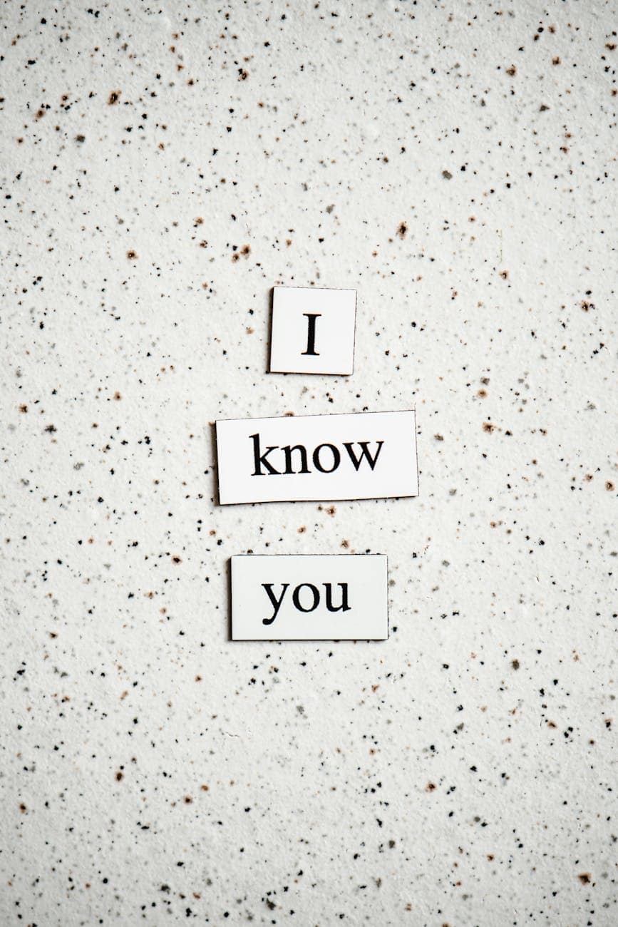 text paper cutouts on a granite surface