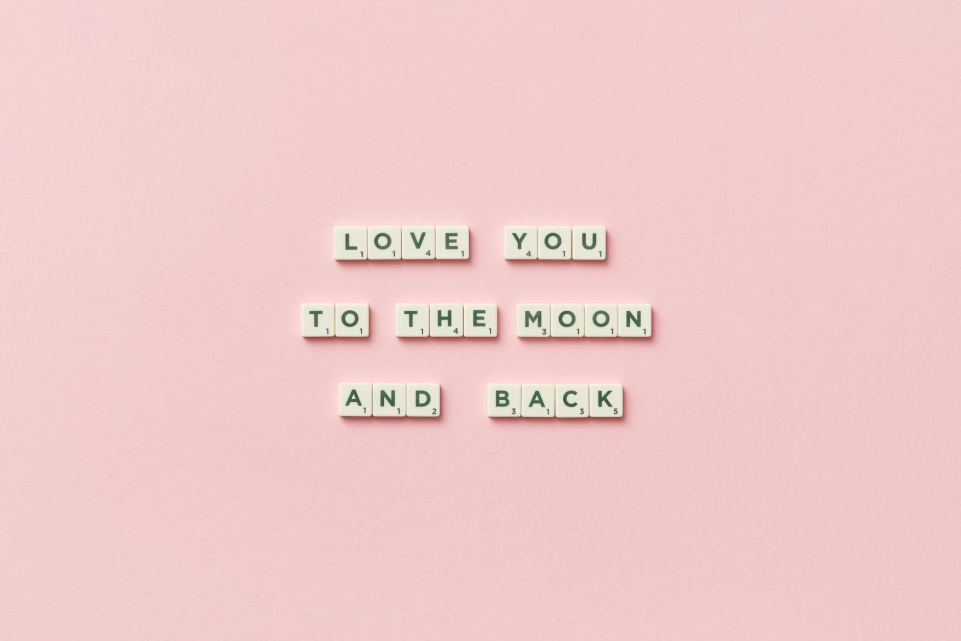 message arranged with scrabble letter tiles